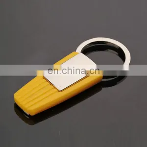 Wholesale Simple Cheap Yellow Color Metal Rubber Keychain With Laser Logo thumbnail-1