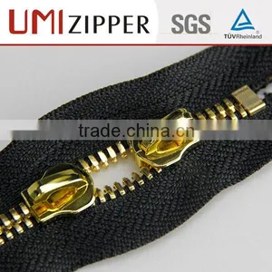 UMI Industrial Gold Teeth Double Ended Metal Zipper Manufacturer thumbnail-1