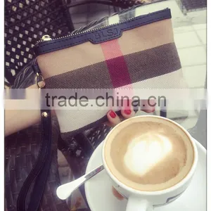 The New Canvas With Leather Clutch Cosmetic Bag thumbnail-2