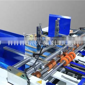 UTM1100B Servo Motor Driven Fast Speed Double Lane Line Automatic Carton Box Window Patching Machine thumbnail-4