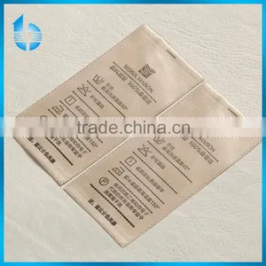China Label Factory Manufature Printing Washing Care Label for Beaded Garment thumbnail-1