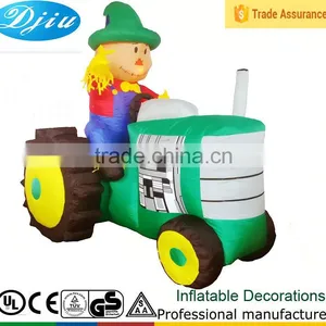Animated Inflatable Farmer/Peasant Toy on Green Tractor With Yellow Wheels thumbnail-1