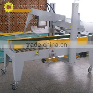Semi-Automatic Flaps Folding And Side Belts Driven Sealer thumbnail-1