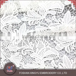 Guangzhou Factory Supply Embroidered Moisture and Cool White Cutwork Embroidery Fabric for Dress thumbnail-2