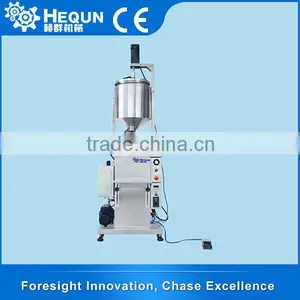 HQ-TVF-1 Small-Scale Pneumatic Liquid & Cream Heat-Preservation Filling Machine thumbnail-1