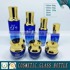 Bule Colored Glass Cosmetic Serum Bottle and Glass Cosmetic Cream Jar With Gold Pump Lid thumbnail-1