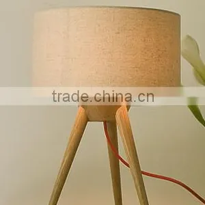 Modern Tripod Wood Table Lamp With Fabric Drum Shade thumbnail-1