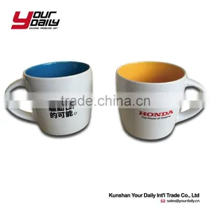 Colored Ceramic Mug With Spoon and Lit thumbnail-1