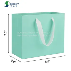 Customized Luxury Golden Hot Stamping Shopping Bag With Ribbon Handle White Cardboard Paper Bag thumbnail-2
