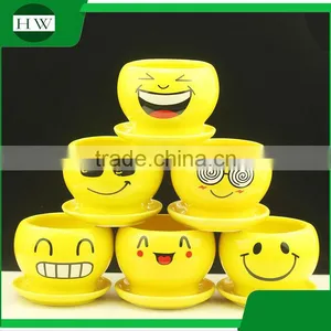 Wholesale Cheap Mini Yellow Round Cup Shape Handwork Decoration Smiling Face Cement Garden Flower Pot thumbnail-2