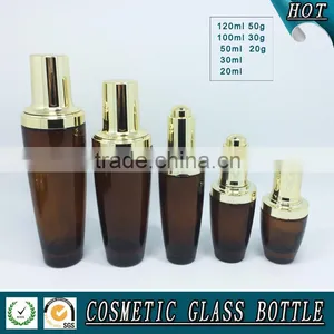 Amber Coloured Cosmetics Glass Bottle and Glass Cream Jar With Shining Gold Lid thumbnail-2