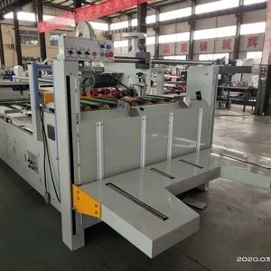 Automatic Corrugated Box Sealing and Strapping Machine thumbnail-4
