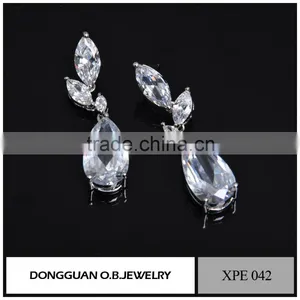 Simple Gold Earring Designs for Women With Big Diamond Earring thumbnail-1