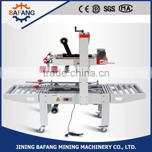 FXJ-6050 Top & Bottom Drive Automatic Strapping Machine thumbnail-1