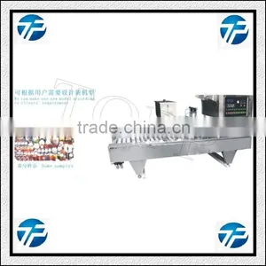 Bottled Milk Filling and Sealing Machine thumbnail-1