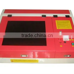 Mini Machine de Gravure Laser CO2 Appliquer a Plexiglace QX--4040 thumbnail-1