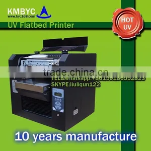A4 Size 6 Color Flatbed Phone Case Printer For Plastic Card Printing uv Digital Curing Ink thumbnail-1
