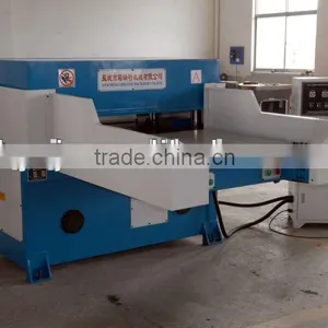 Double-Side Auto-feeding Auto-balance Precise Hydraulic Four-Column Plane Cutting Machine thumbnail-1
