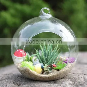 Artificial Terrarium Plants in Hollow Glass Ball With Cartoon Characters for Christmas and Home Decoration thumbnail-1