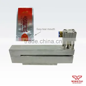 Easy Tearing Mouth Punching Machine thumbnail-1