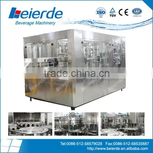 2,000 Bottles per Hour Small Bottle Filling and Capping Machine thumbnail-1