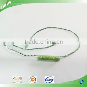 China Gold Supplier, Customize Gold Color Seal Tag With Letters Embossed on Light Freshening Green Garment Plastic Hang Tag thumbnail-1