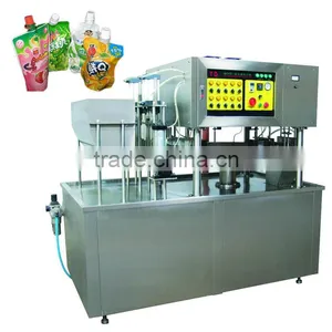 Automatic Juice Milk Stand Up Pouch With Spout Filling And Sealing Machine Water Stand Up Pouch Packing Machine thumbnail-1