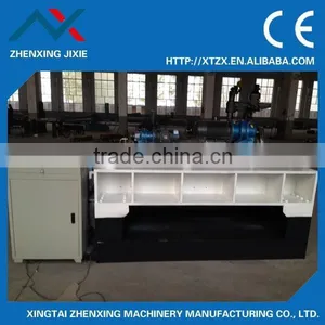 China Log Peeling Machine Spindleless Lathe Plywood Making Machine thumbnail-1