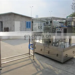 Filling Capping Screwing Packaging Machine for Packing Plastic Drinking Water Pouch With Spout Mouth and Cap thumbnail-4