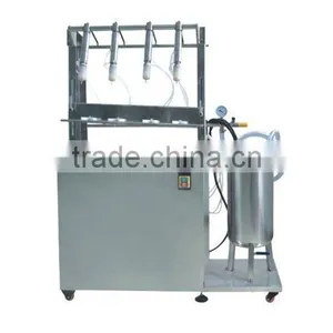 Semi Automatic 4 Nozzless Perfume Filling Machine thumbnail-1