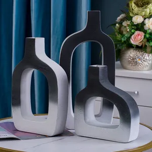 Nordic Light Luxury White Black Hollow Out Art Different Size Ceramic Vase For Hotel Table thumbnail-1