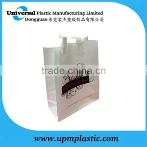 Customized Good Quality Flexo Printing Block Bottom Colored Soft Loop Handle Plastic Bag for Carring thumbnail-1