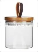 Small Glass Round Canister With Rubber Wood Lid thumbnail-1