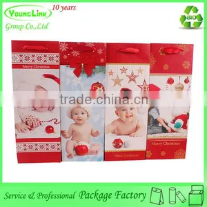 Adorable Child Toy Christmas Paper Bag With Ribbon thumbnail-1
