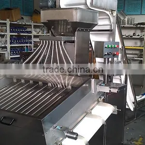 Paintball and Softgel Capsule Sorting Machine With Conveyor Under Sorting Rollers thumbnail-1