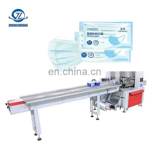 Manufacturer Candy Type Filling Beneath Feeding Cutlery Automatic Packing Horizontal Face Mask Pillow Packaging Machine thumbnail-1
