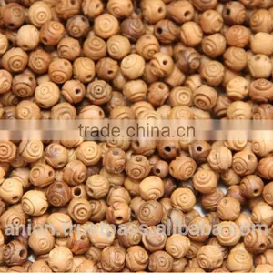 Olive Wood Carved Round Beads thumbnail-1