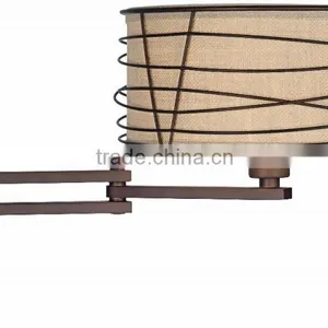 1031-1 Wire Cage Detail Surrounds a Burlap Shade a Rich Bronze Metal Swing Arm Wall Lamp thumbnail-4