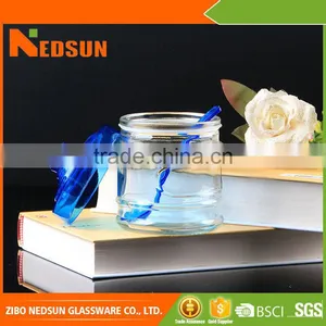 Quality Products Embossed Smooth Top Sale Glass Jar With Spoon thumbnail-1