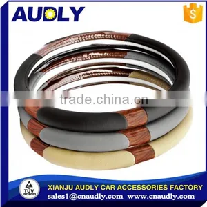 Custom Accessories Black Steering Wheel Cover With Woodgrain Design and Chrome Trim thumbnail-2
