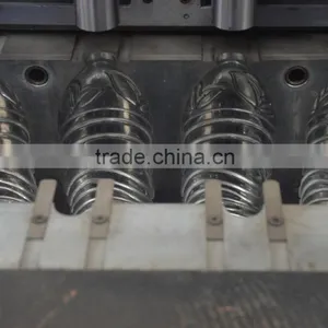 High Quality Semi Automatic 4 Cavities Drinking Water Bottle Blow Molding Machine thumbnail-5