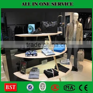 First Rate Ladies Clothes Shop With Metal and Wood Display Racks thumbnail-2