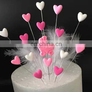 Unique Design Baby Birthday Party Decoration Clay Baby Carriage Heart Shaped With Feather Cake Topper thumbnail-2