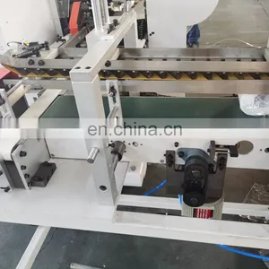 High Speed Automatic Toilet Roll Paper Plastic Film Packing Machine thumbnail-5