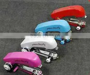 MINI PORTABLE CORDLESS HAND-HELD CLOTHES SEWING MACHINE thumbnail-1