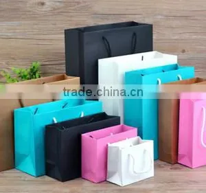 Newest Design Customer Logo Printed Paper Handbags Luxury Packaging Paper Bags Fashion Promotional Garment Bag thumbnail-6