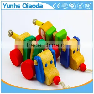 Colorful Pull Along Wiggles Dog Wooden Toy Wiggles as You Pull They Make a Clicking Sound and Make a Fun Baby thumbnail-1
