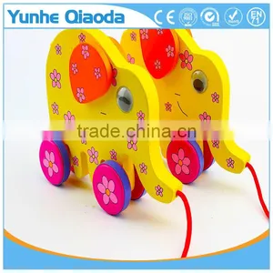 Colorful Pull Along Elephant Wooden Toy as You Pull They Make a Fun for Baby thumbnail-1