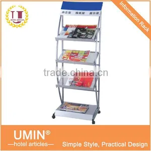 Metal Magazine Rack With Wheels thumbnail-1