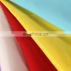 Chinese Popular Colorful Microfiber Polyester Peach Skin Fabric Soft Shell Best Clothing Fabric for Beach Shorts, Garment thumbnail-1